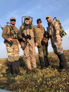 Group of caribou hunters